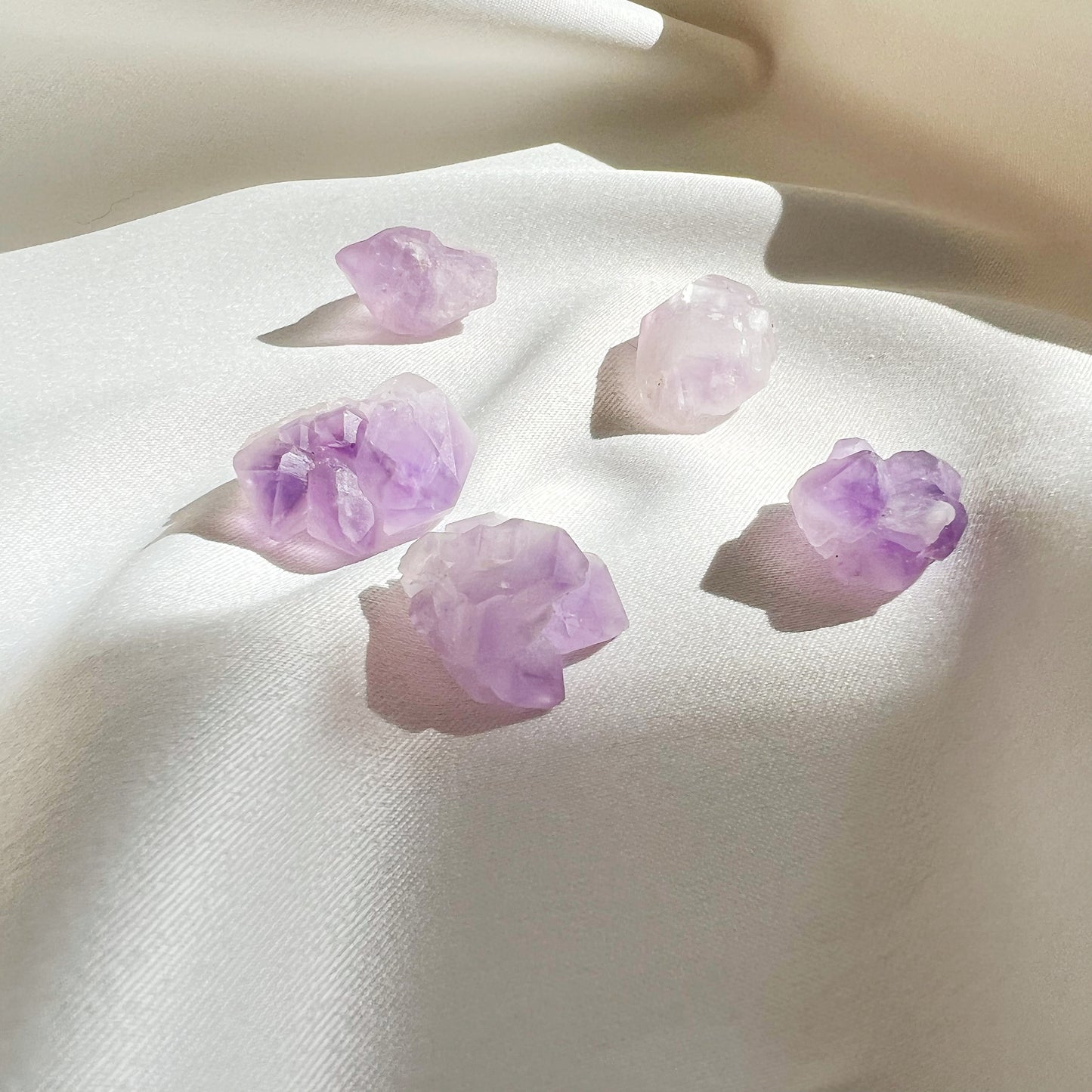 This listing is for five (5) mini Amethyst Flowers. Your 5 amethyst flowers will be intuitively chosen just for you.  Amethyst is a crystal of protection, wisdom, calming energy and aids in stress relief.   Size: approximately 1 inch by .5 inches  *Each Amethyst flower is unique, and the photos are a representation of what you will receive. I will intuitively select your Amethyst flower just for you.  